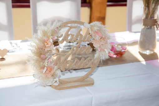 table des maries french text means Wedding table bride groom decoration with flowers in marriage party room restaurant