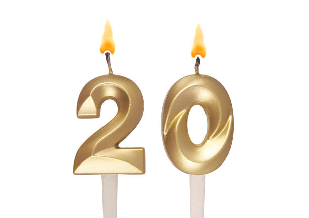istock Golden birthday candles isolated on white background, number 20 1496600747