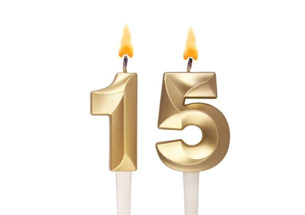 istock Birthday candles isolated on white background, number 15 1496602938