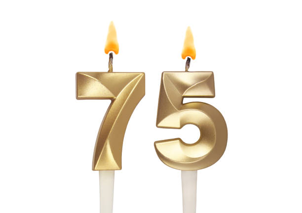 istock Birthday candles isolated on white background, number 75 1496603020