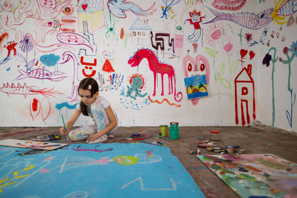 istock Little girl being creative in an Art studio 1496604145