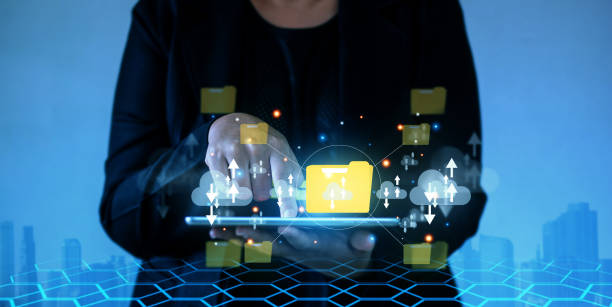 istock Businesswoman using laptop showing cloud computing diagram shown up a hand. Cloud technology.  data storage Finance and protection, network connection and internet service concepts. 1496604553