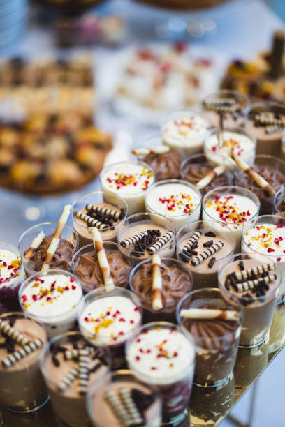 istock Delicious wedding reception candy bar dessert table 1496606611