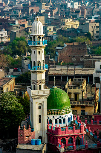 A historic mosque and cityscape in Lahore