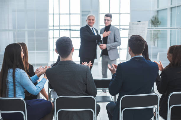 istock Manager is introducing a new employee of the company 1496612461
