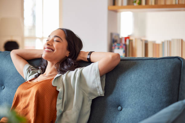 istock Smiling multiethnic woman relaxing at home with copy space 1496613434
