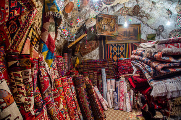 istock Turkish traditional silk production, silk thread extracting from cocoon in water. 1496615207