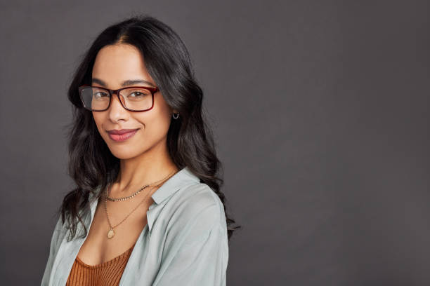 istock Beautiful mixed race woman with eyeglasses looking at camera 1496615744