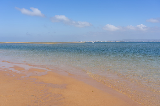 Beach in the deserted island in the Formosa estuary natural park in Algarve region, Portugal