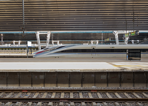 Denver, CO - March 7, 2021: Sweeping, modern architecture of the train platform at Uniion Station in downtown Denver, Colorado