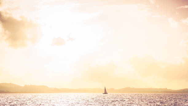 Yacht in ocean panorama stock photo