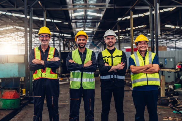 istock Workers Factory or Engineering work at factory site check up machine or products in site. Foreman or Technician checking Material or Machine on Plant. Heavy industry factory concept. 1496630072