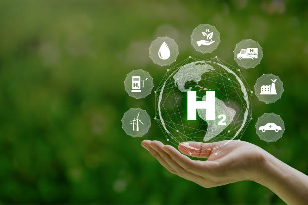 istock H2 hydrogen innovation zero emissions technology in hand. Clean hydrogen energy concept.Hydrogen production.Hydrogen Industry Concept. 1496631369