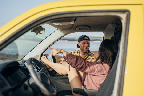 istock Couple on the road trip at the beach 1496637409