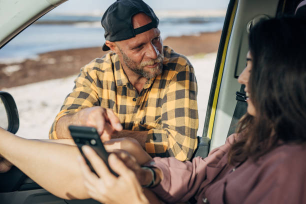 istock Couple on the road trip at the beach 1496637465