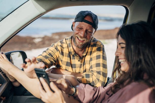 istock Couple on the road trip at the beach 1496637630