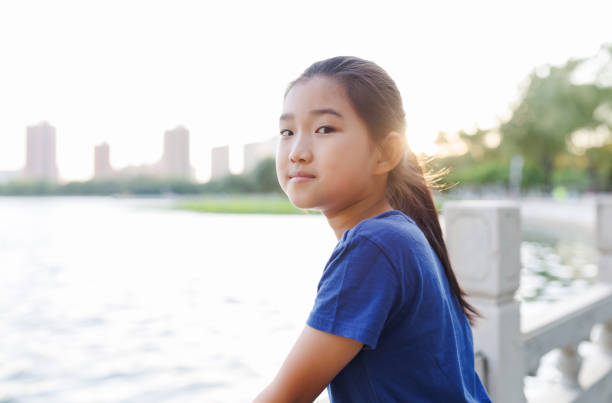 istock Little Girl by the Lake 1496640848