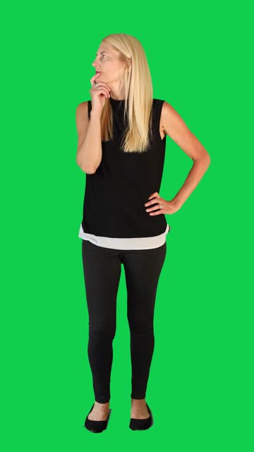 Woman on Green Screen Thinking About Something