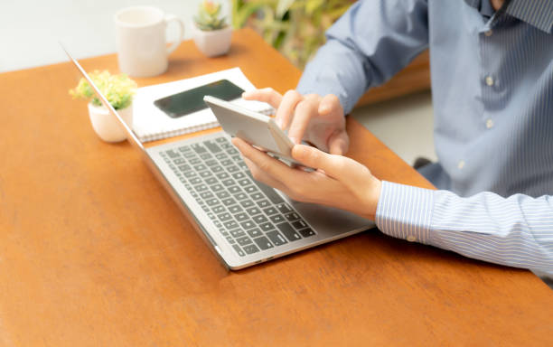 istock Business people utilize calculators and laptops to perform complex calculations with precision and efficiency. 1496642261
