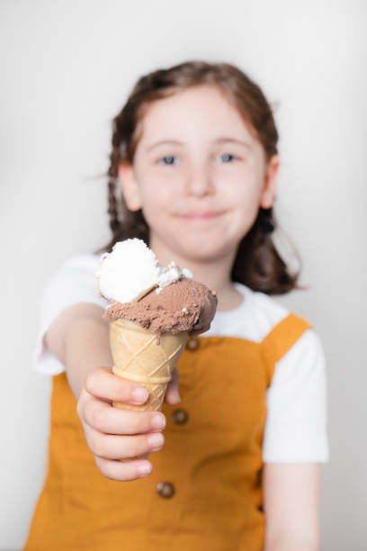 istock Lovely girl eating ice cream 1496644677