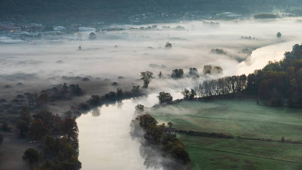istock Autumnal sunrise over the Adda River 1496646470