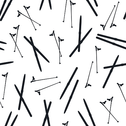 Seamless vector pattern of ski poles and cross-country skis black on white