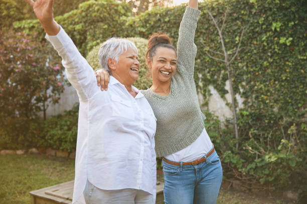 istock Daughter spending time with her mom outdoors 1496655363
