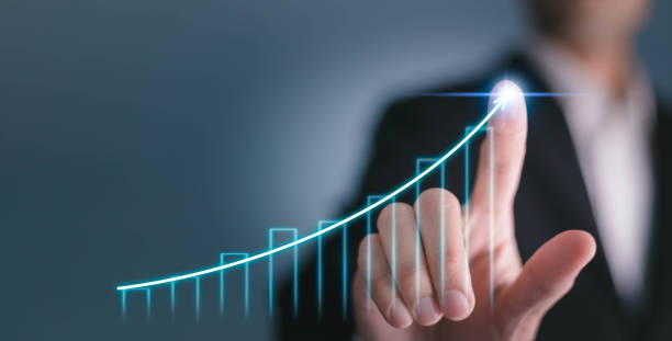 istock Business growing growth concept and development to success, Businessman pointing arrow graph corporate future growth plan 1496656946