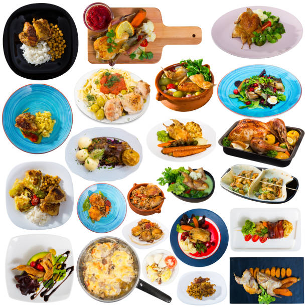 istock Dishes with cooked fried chicken and baked quail with different vegetables 1496659699
