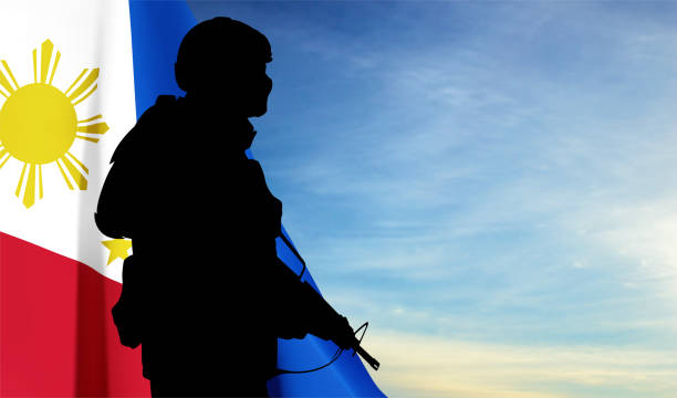 istock Silhouette of a soldier with Philippines flag 1496659870