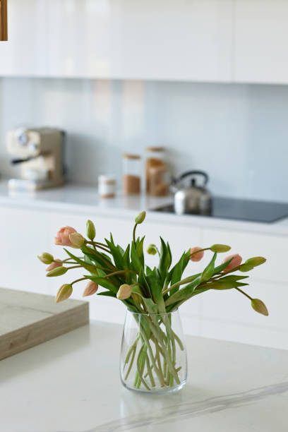 istock Flowers in vase in the kitchen 1496662564