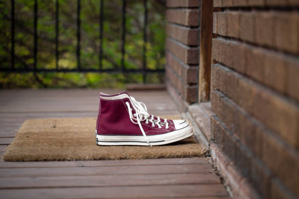 istock Red men's shoe on the porch 1496668901