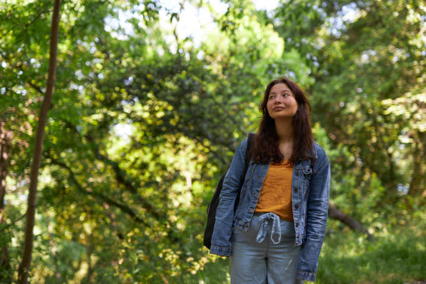 istock young girl enjoying nature 1496669474
