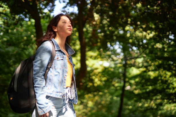 istock young girl enjoying nature 1496670070