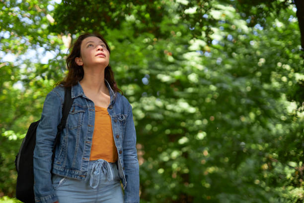 istock young girl enjoying nature 1496670104