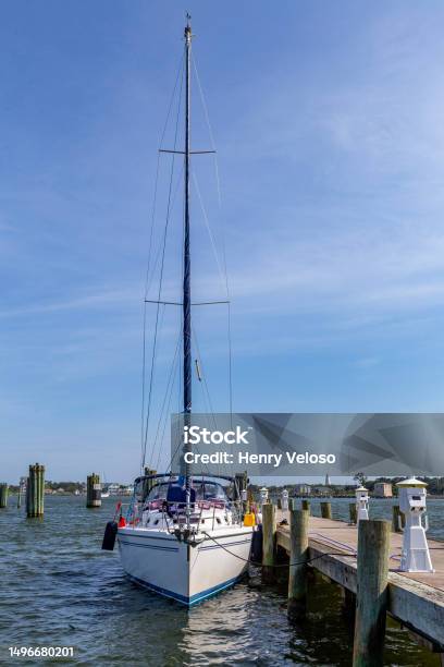 Sail Boat Docked Stock Photo - Download Image Now - Bay of Water, Beach, Blue