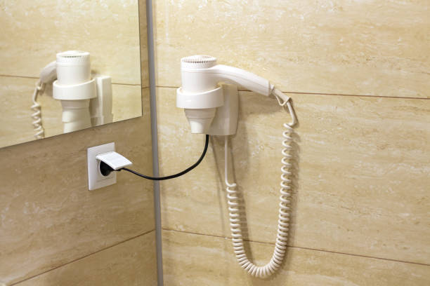 istock Hair dryer in hotel bathroom service concept 1496681238