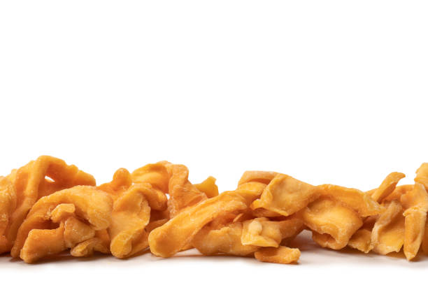 istock Dried melon slices isolated on a white background. 1496681662
