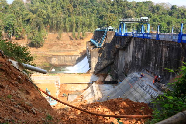 istock construction workers do maintenance at peruvannamuzhi (peruvannamoozhi) dam, Kerala, India, Kuttyady (Kuttiady, Kuttyadi) 1496683914