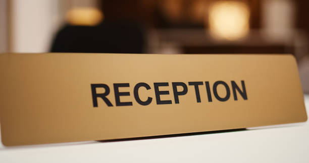 istock Extreme close up of hotel reception sign 1496683998