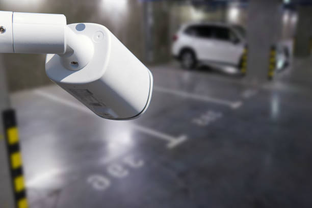 istock CCTV camera or surveillance system on indoor car parking. 1496684160