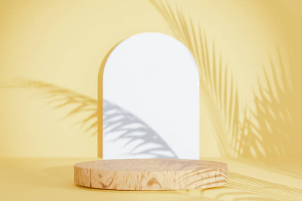 istock 3d podium with palm leaves on yellow abstract background. Copy space for product display presentation. Graphic render art design. 1496684877