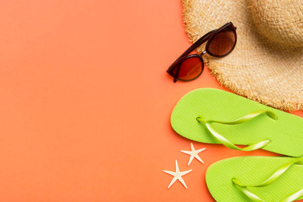 istock Summer vacation concept flat lay. straw hat beach accessories and towel top view. Space for text. travel concept 1496685479