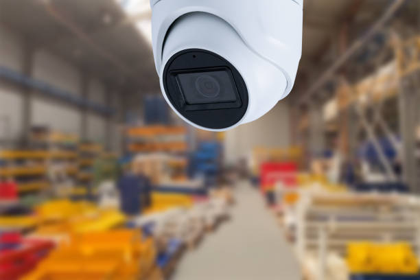 istock CCTV Camera or surveillance operating inside industrial factory. Copy space. 1496686429