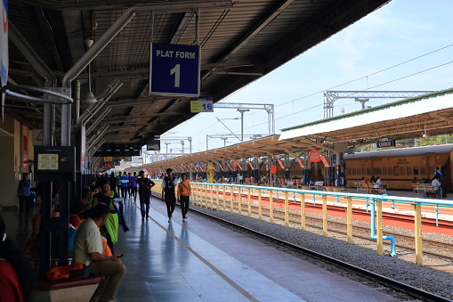 December 30 2022 - Kannur, Kerala in India: People waiting for the Train at Railway station in South India