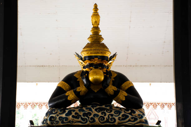 Ancient rahu titan deity demon lunar eclipse statue for thai people travelers travel visit respect praying blessing wish holy mystery at Wat Sisa Thong or Si Sa Thong temple in Nakhon Pathom, Thailand