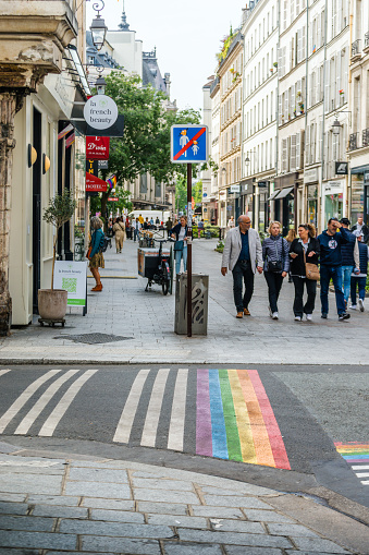 Paris, France - May 22, 2023: Rainbow pedestrian crossing in the Marais district. The Marais (Le Marais in French, meaning 