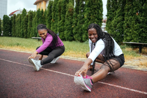 istock Two women exercising together 1496690589