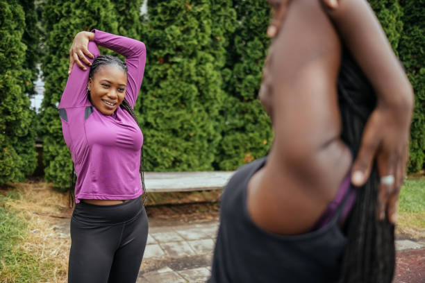 istock Two women exercising together 1496690881