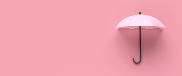 istock Pink umbrella isolated on a pink background. 1496692594